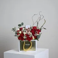 Rocher's bostani with red roses