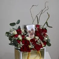 Rocher's bostani with red roses