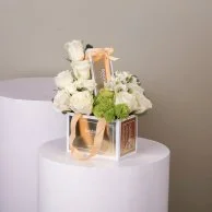 Bag and Bostani chocolate with natural white roses 4