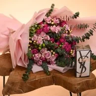 A bouquet of roses with Yves Saint Laurent Libre Intense perfume 90 ml (women)