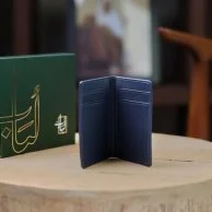 محفظة جلد كحلي ثنائية الطي | لُباب