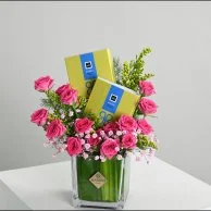 Fuchsia vase with chocolate bar from Patchi