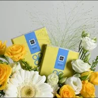 Yellow vase with chocolate bar from Patchi