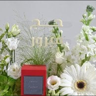 Hajj Gifts | Cartier Perfume with White Floral Arrangement