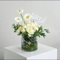 A vase with a reward and wellness tag