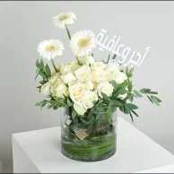 A vase with a reward and wellness tag