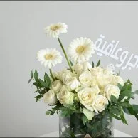 A vase with a reward and wellness tag