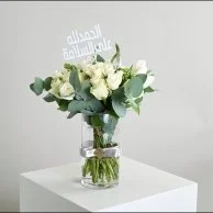 A vase with a tag, thank God for your safety
