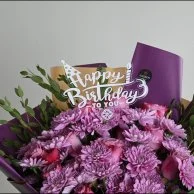 A bouquet of violet Christmas roses