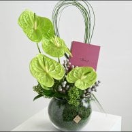 Green anthurium vase with a rosary from Shakah