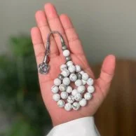 White with a rosary from Shakah