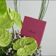 Green anthurium vase with a rosary from Shakah