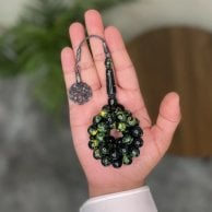Green anthurium vase with a rosary from Shakah
