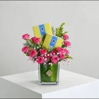 Fuchsia vase with chocolate bar from Patchi