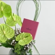 Green anthurium vase with a rosary from Shakah