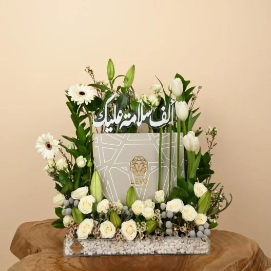A get-well-soon flower arrangement paired with Livo chocolates