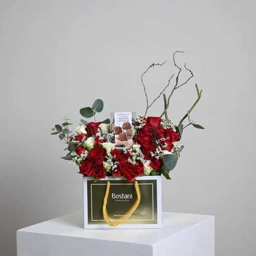 Rocher's bostani with red roses