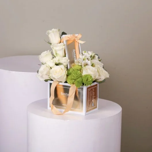 Bag and Bostani chocolate with natural white roses 4