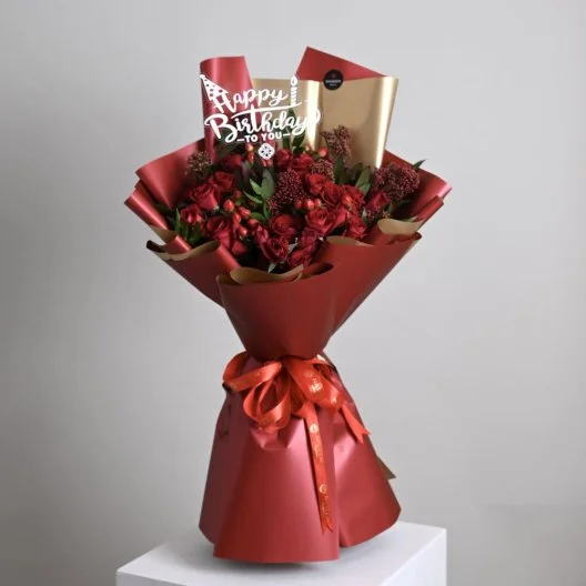 A warm bouquet of roses happy birth day