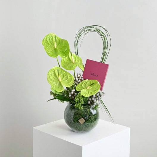 Green anthurium vase with a rosary from Shakah