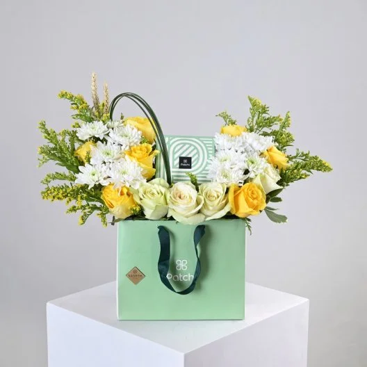 كيس وتشوكليت باتشي مع الورد الأصفر الطبيعي 1