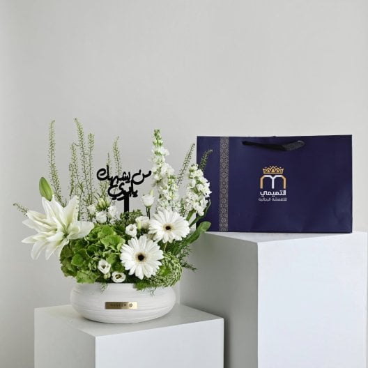 A vase that resembles you, my father, in white | With a thobe fabric from Al-Tamimi