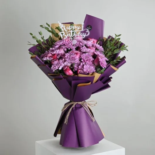 A bouquet of violet Christmas roses