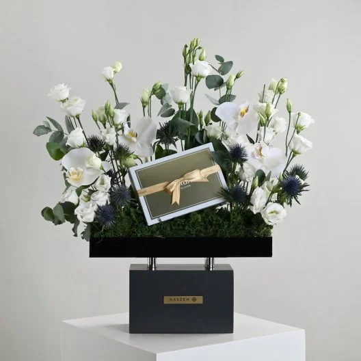 Naseem's special orchid arrangement with Boustani Chocolate
