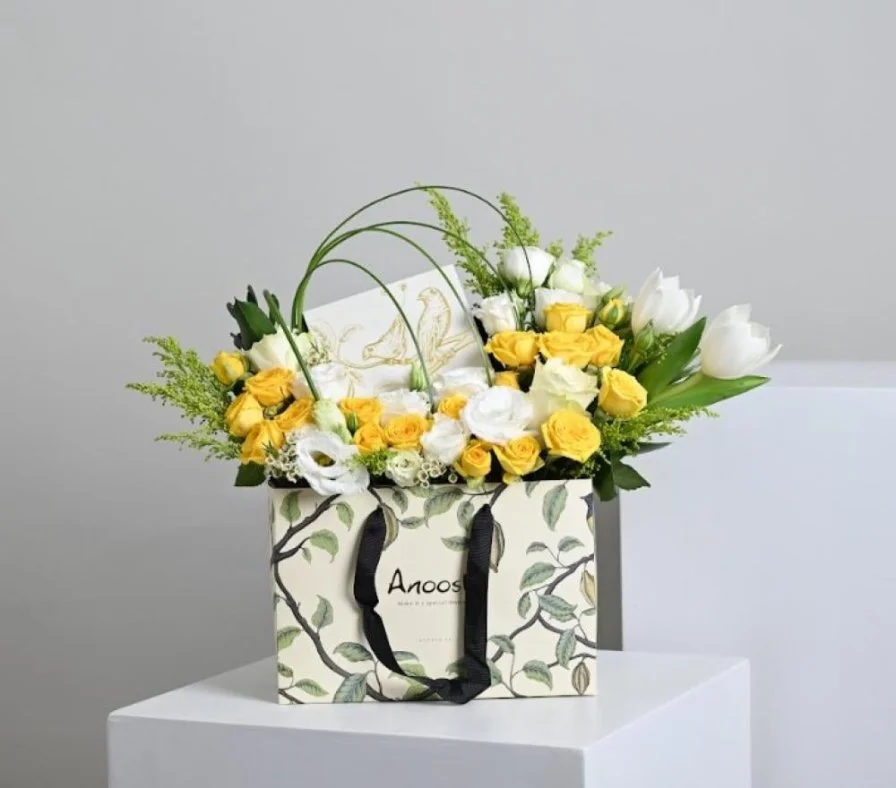 Anoush with yellow roses
