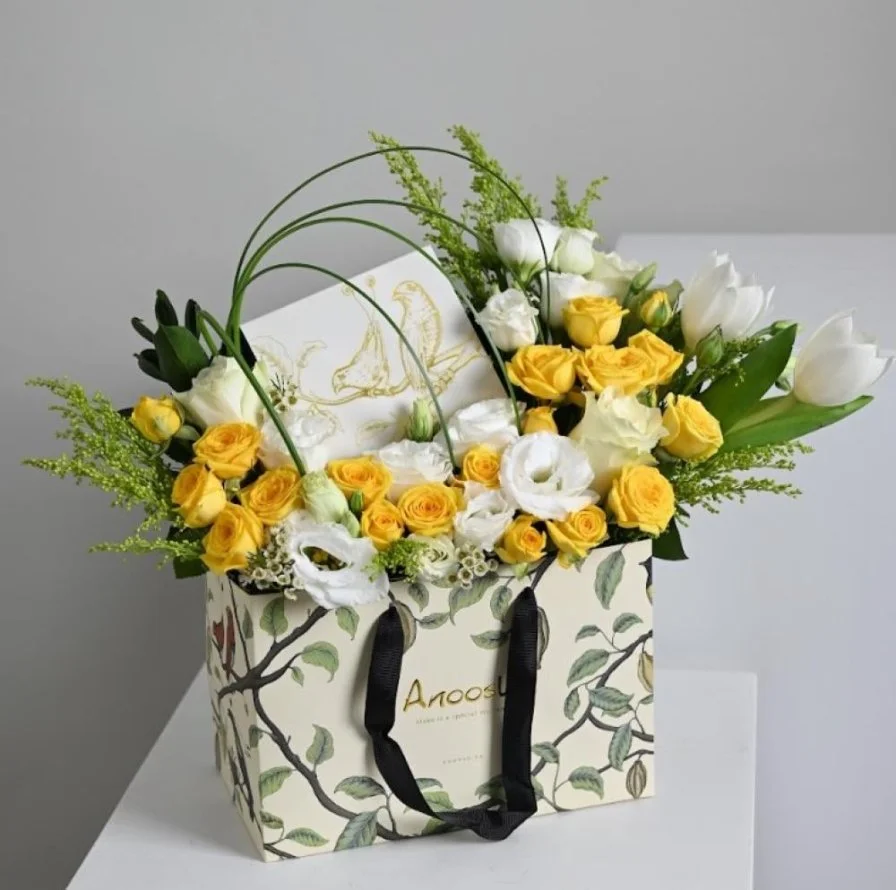 Anoush with yellow roses