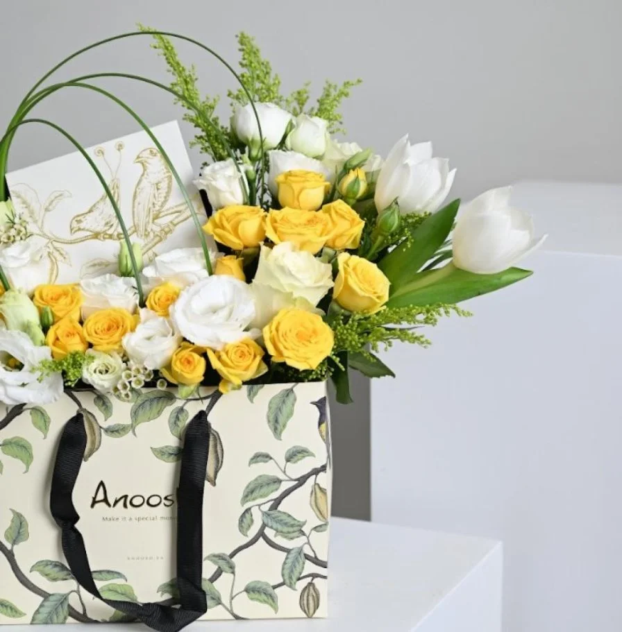 Anoush with yellow roses