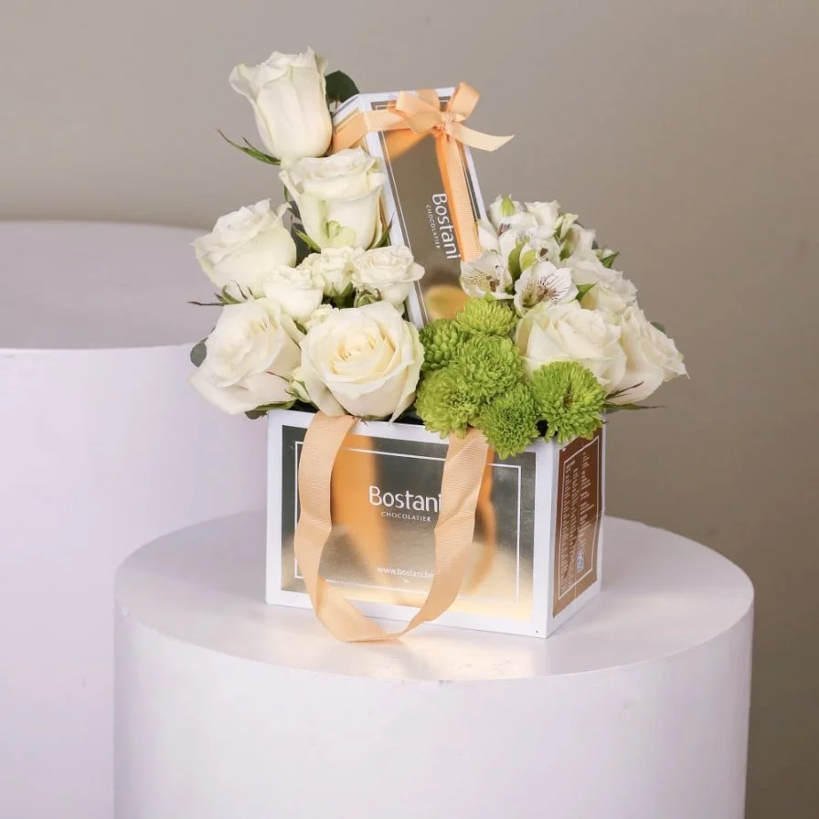 Bag and Bostani chocolate with natural white roses 4