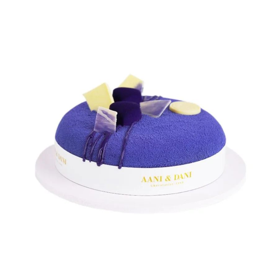 A package of purple ostomy vase with blue velvet cake from Annie and Danny, medium size