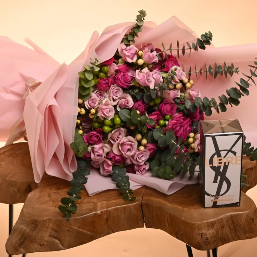 A bouquet of roses with Yves Saint Laurent Libre Intense perfume 90 ml (women)