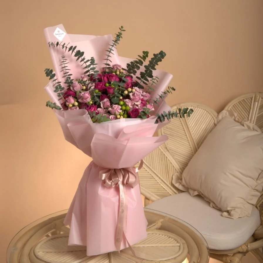 A bouquet of roses with Yves Saint Laurent Libre Intense perfume 90 ml (women)