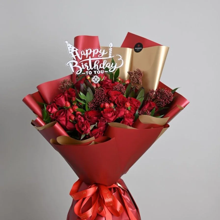 A warm bouquet of roses happy birth day
