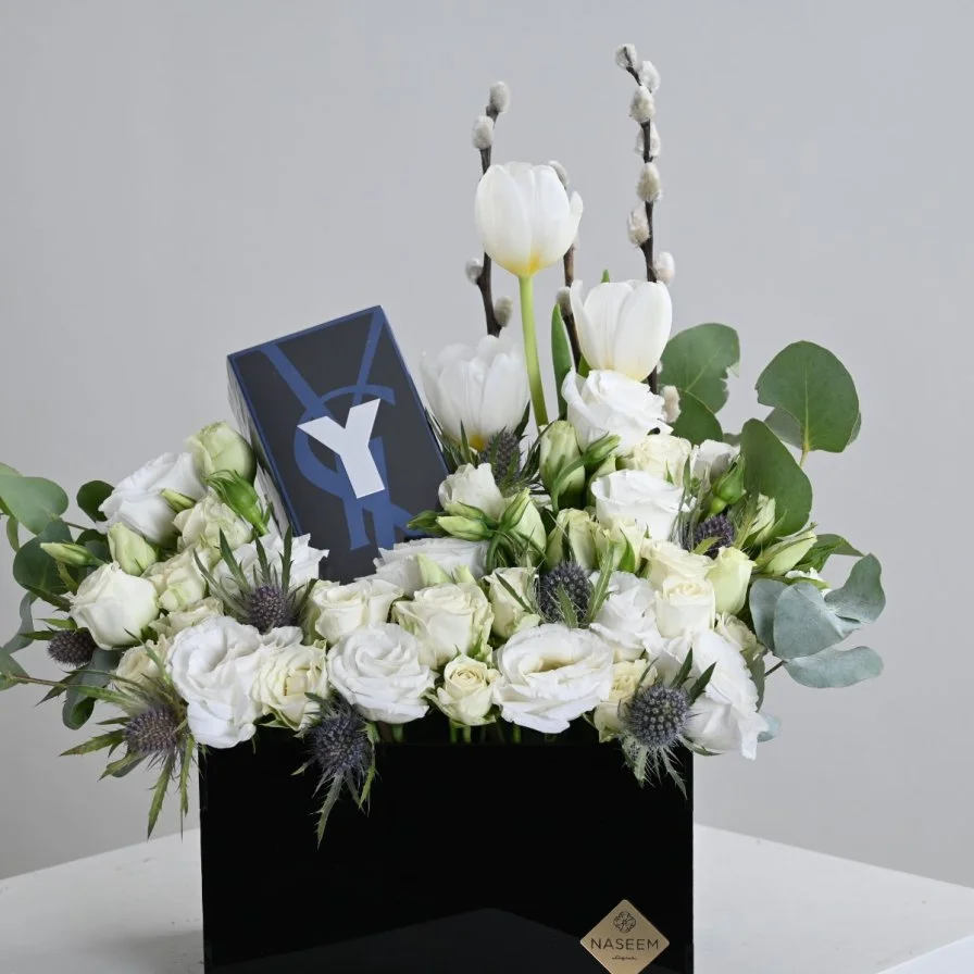 Yves Saint Laurent Y perfume with white roses