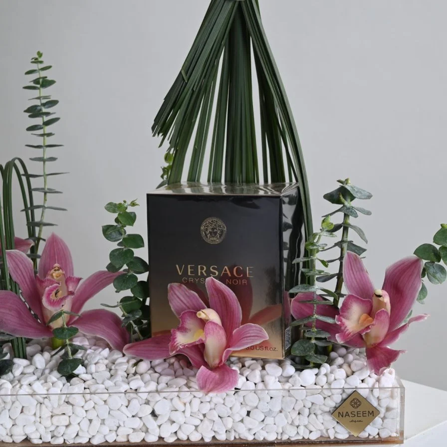 عطر نوار من فيرزاتشي مع زهور السمبيديوم