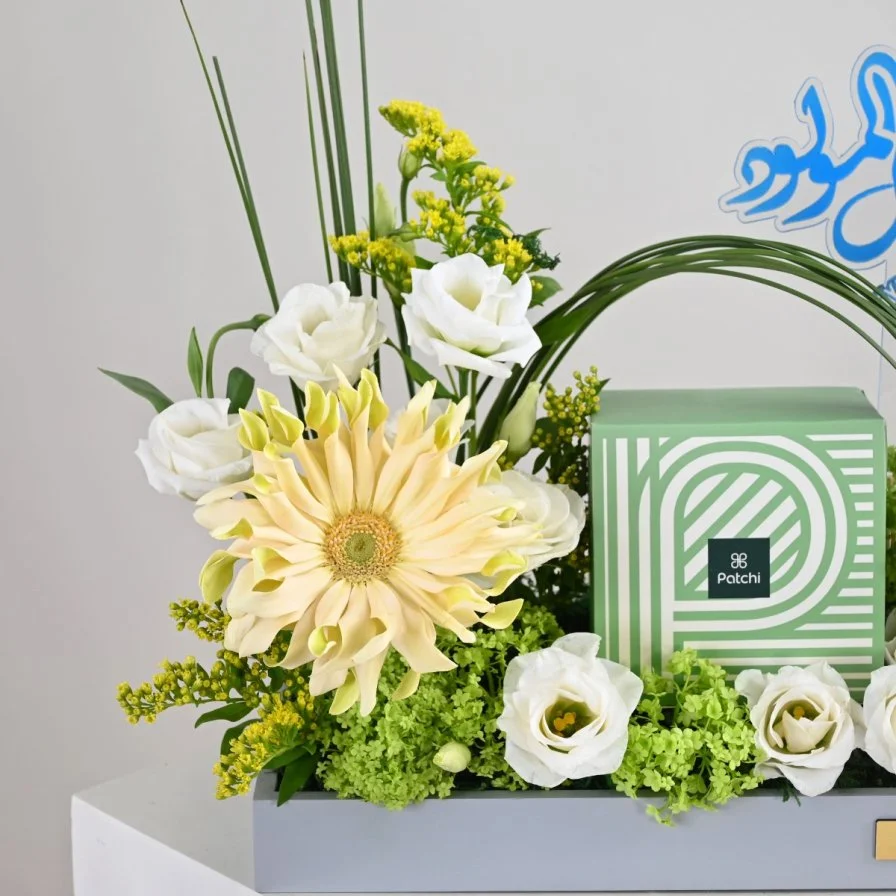 New Baby Boy Gerbera Arrangement | Patchi Chocolate