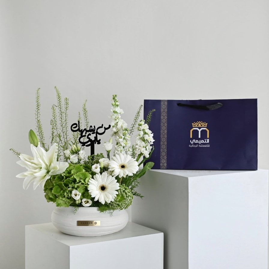 A vase that resembles you, my father, in white | With a thobe fabric from Al-Tamimi