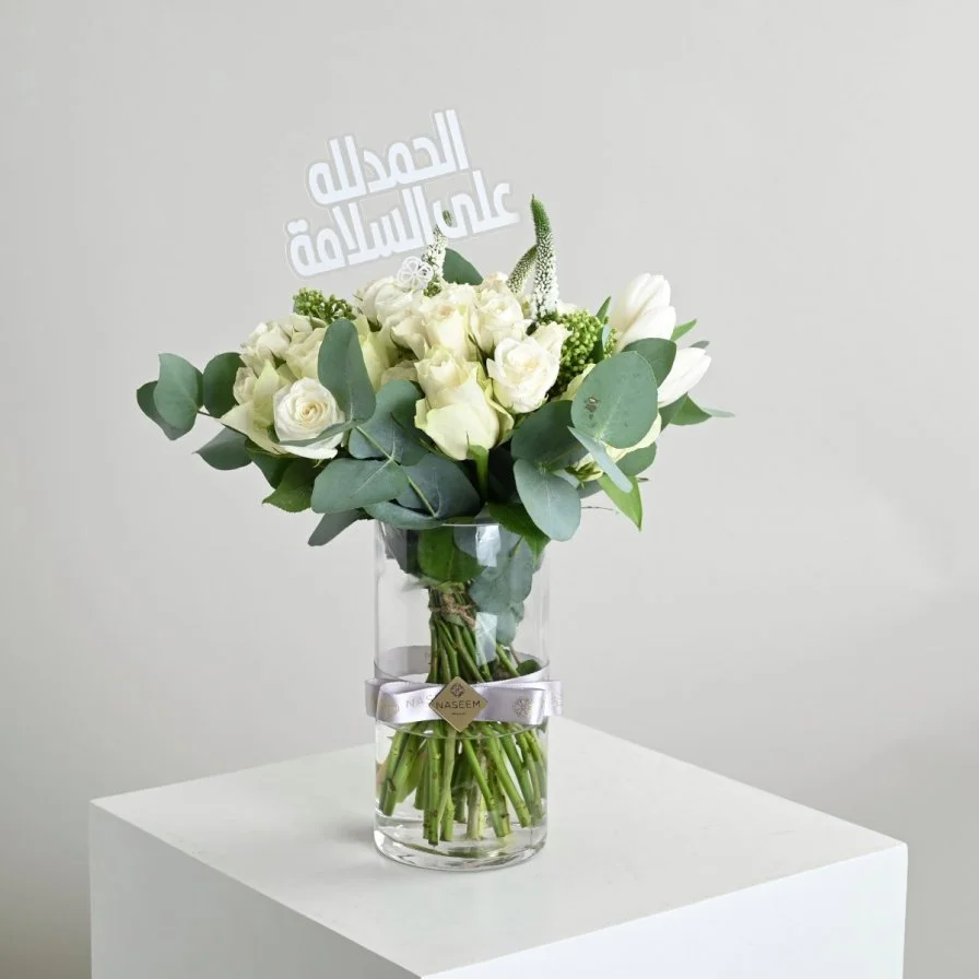 A vase with a tag, thank God for your safety