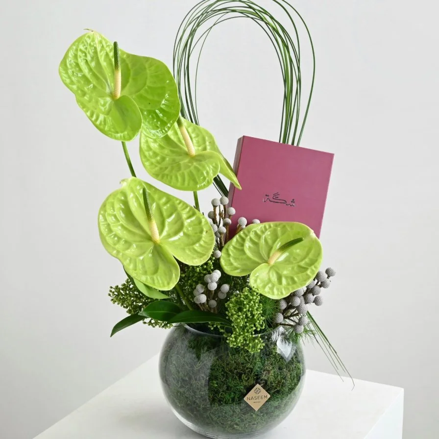 Green anthurium vase with a rosary from Shakah
