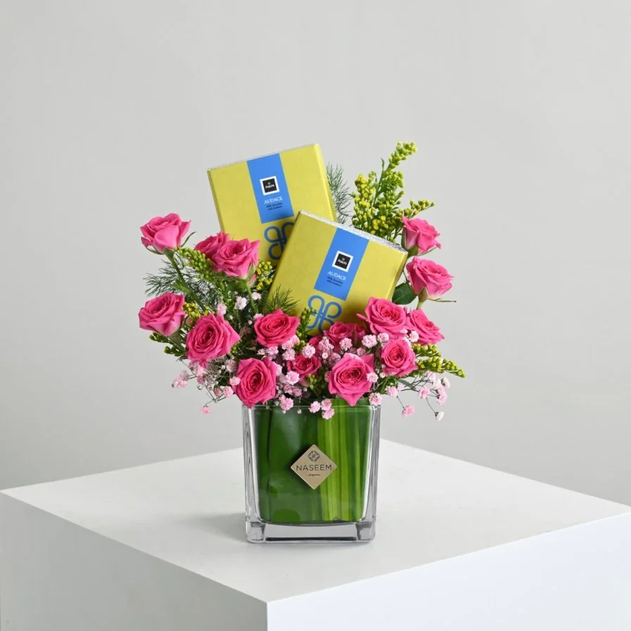 Fuchsia vase with chocolate bar from Patchi