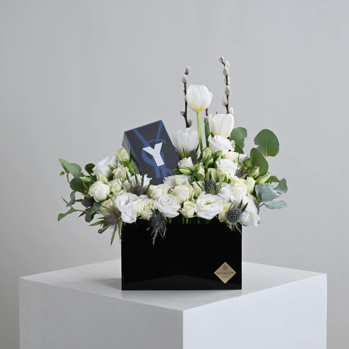 Yves Saint Laurent Y perfume with white roses