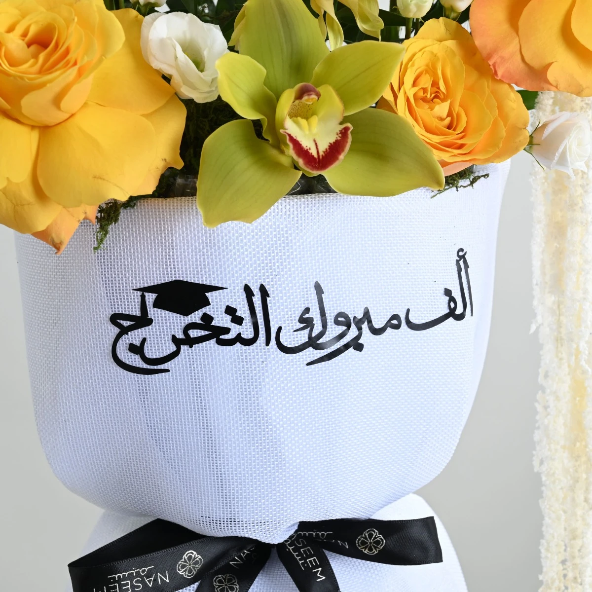 بوكيه التخرج | زهور الجيرابيرا و السمبيديوم