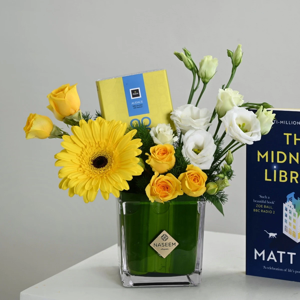 Depth | Flowers and Chocolate with The Midnight Library book