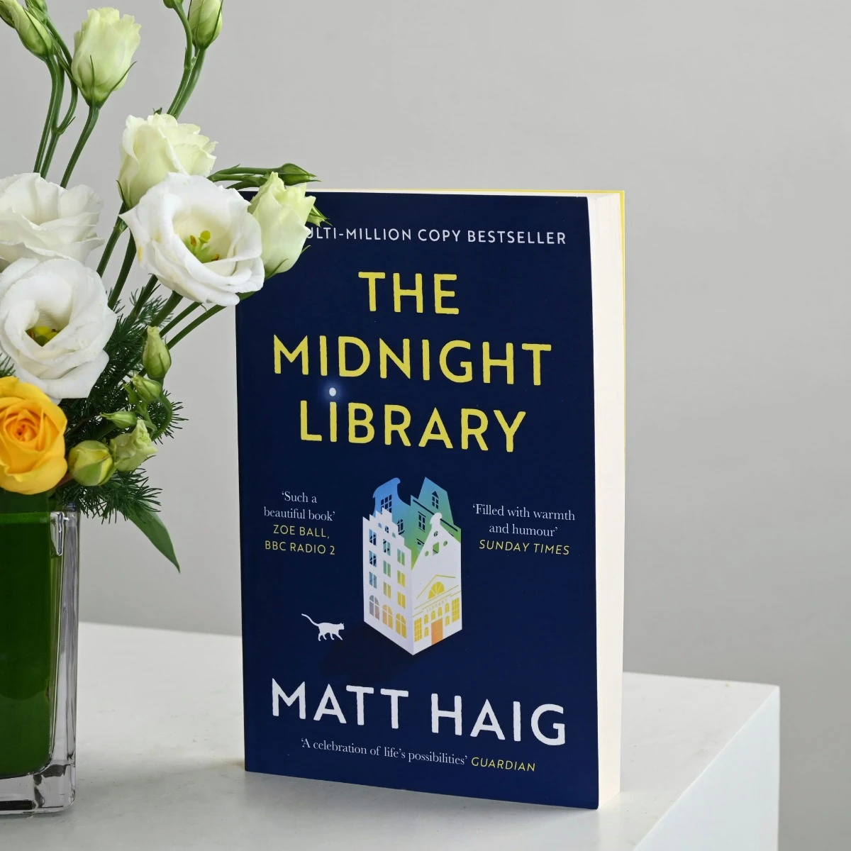 Depth | Flowers and Chocolate with The Midnight Library book
