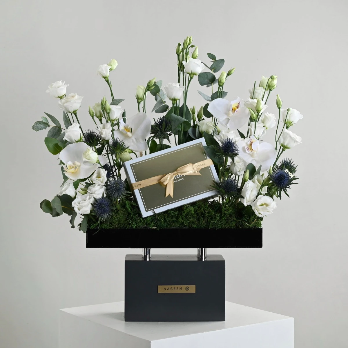 Naseem's special orchid arrangement with Boustani Chocolate